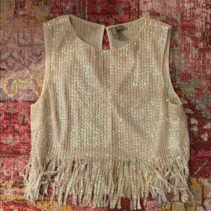 Iridescent sequin party top with sequin fringe hem